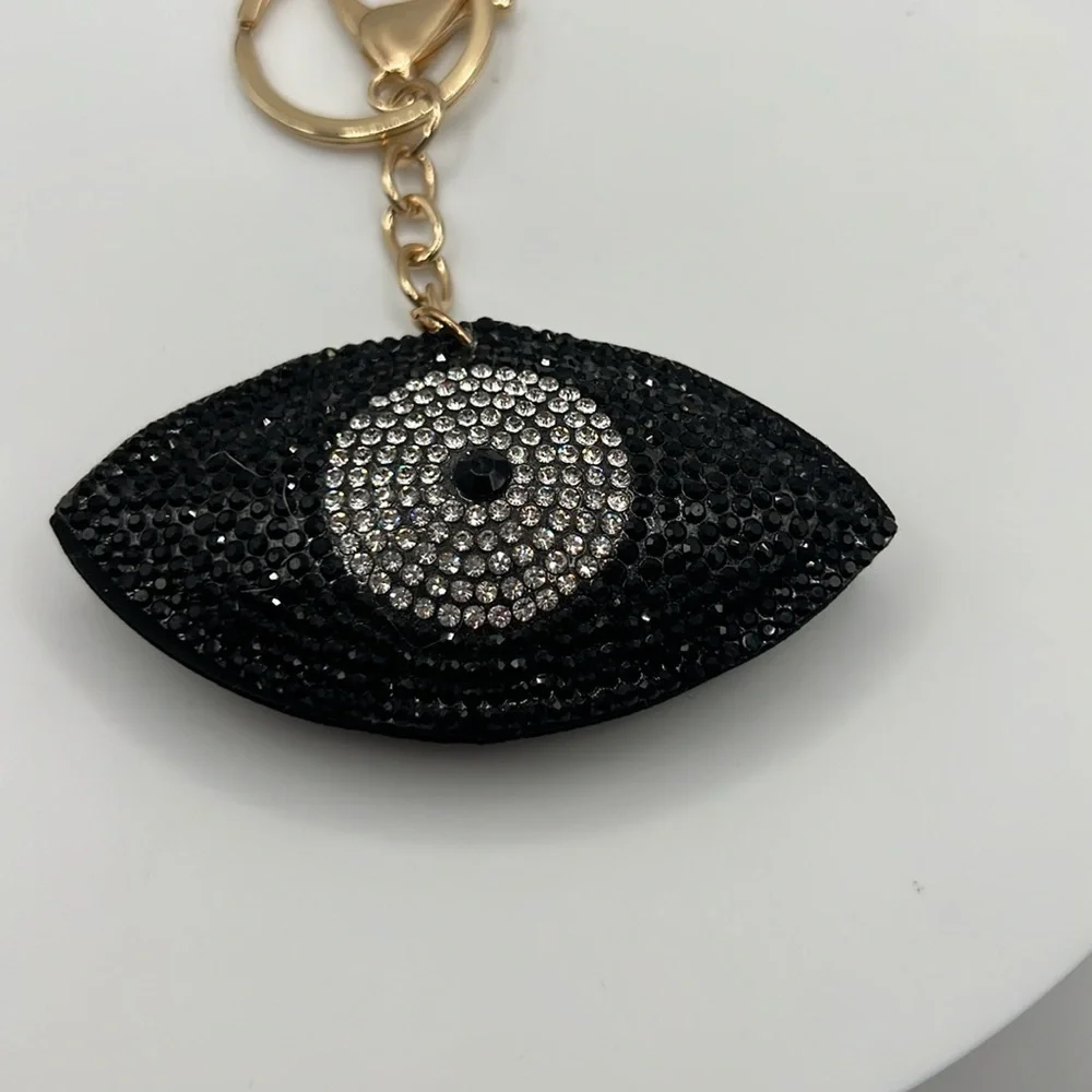 016. Black and Silver Eye Keychain with Rhinestones Gold Hardware